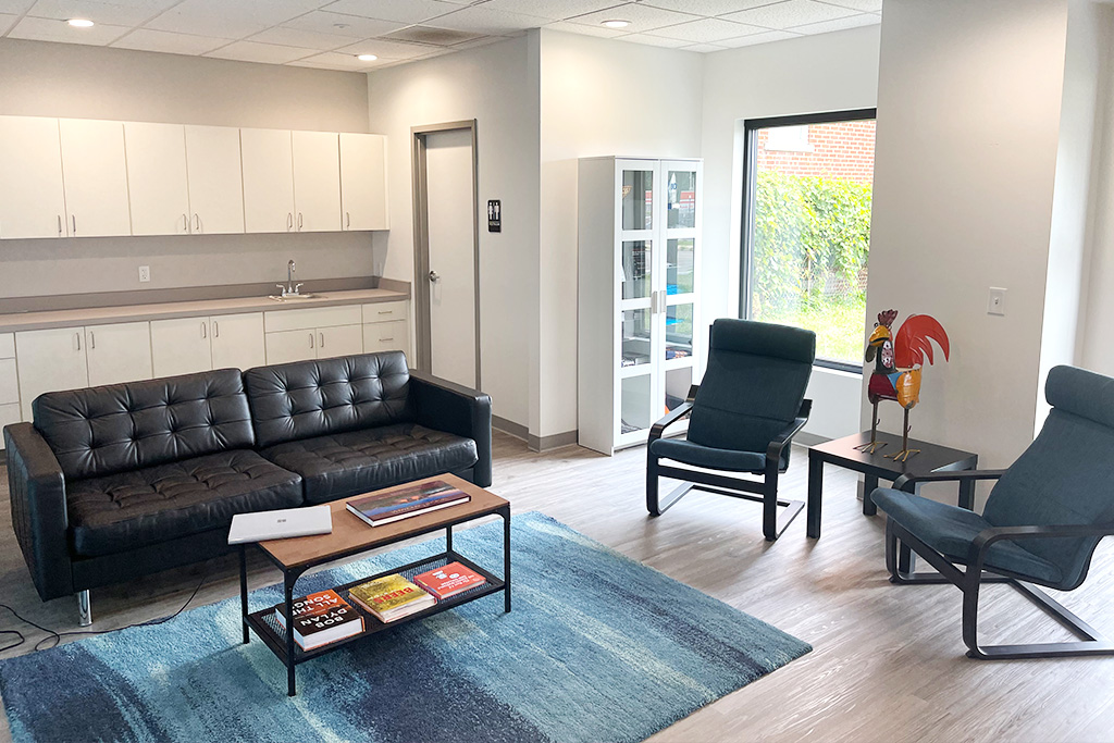 Seating area inside a ROOST Real Estate Co. office